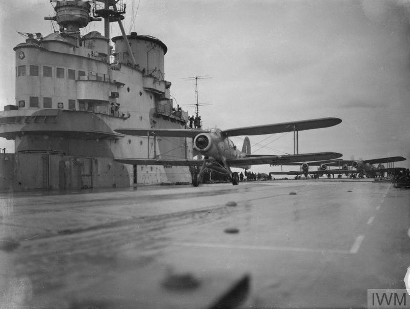 An Albacore taking off from HMS Victorious at dawn to attack the German battleship Tirpitz, 9 March 1942. Photo: Lt C. H. Parnall, RN official photographer — IWM (public domain).
