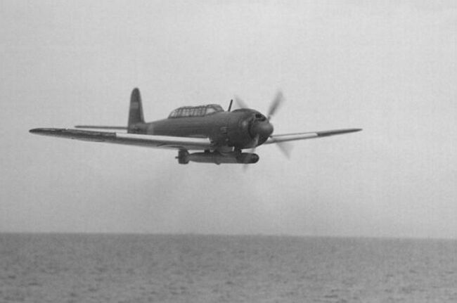 A Tenzan banking on a torpedo run the long greenhouse canopy is clearly visible.