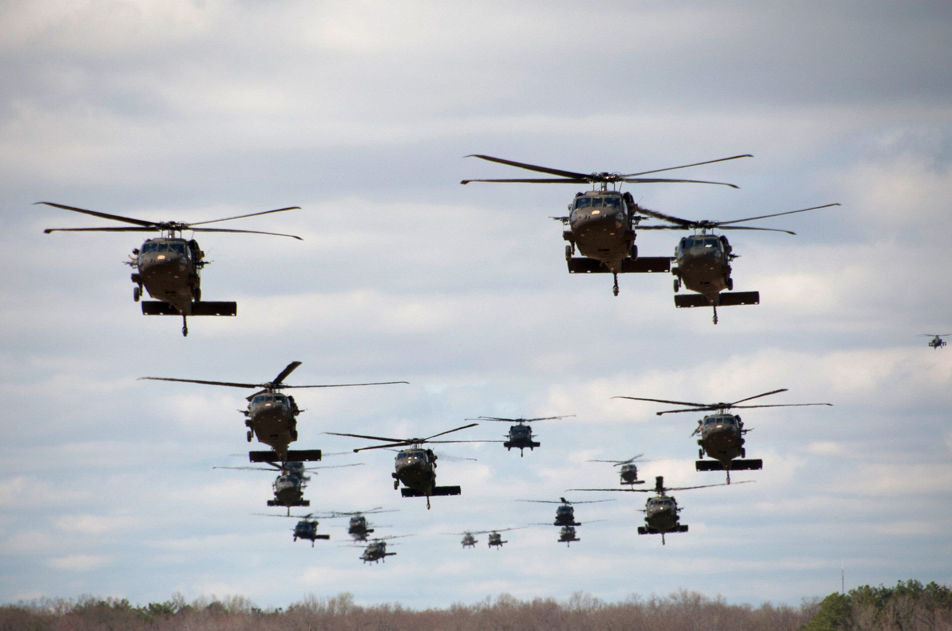 US Army Sikorsky UH-60 Black Hawk helicopters flying in formation