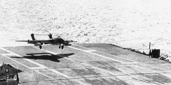 A Sea Vixen of 892 NAS landing aboard USS Ranger during cross-deck operations, 1963.