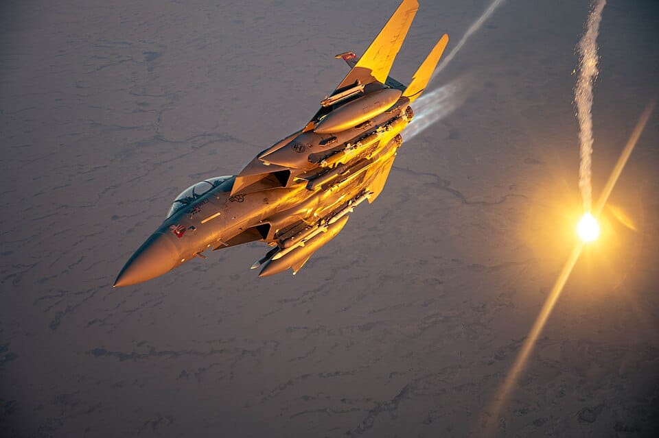 F-15E Strike Eagle deploying flares - the same type shot down over Iran in April 2026