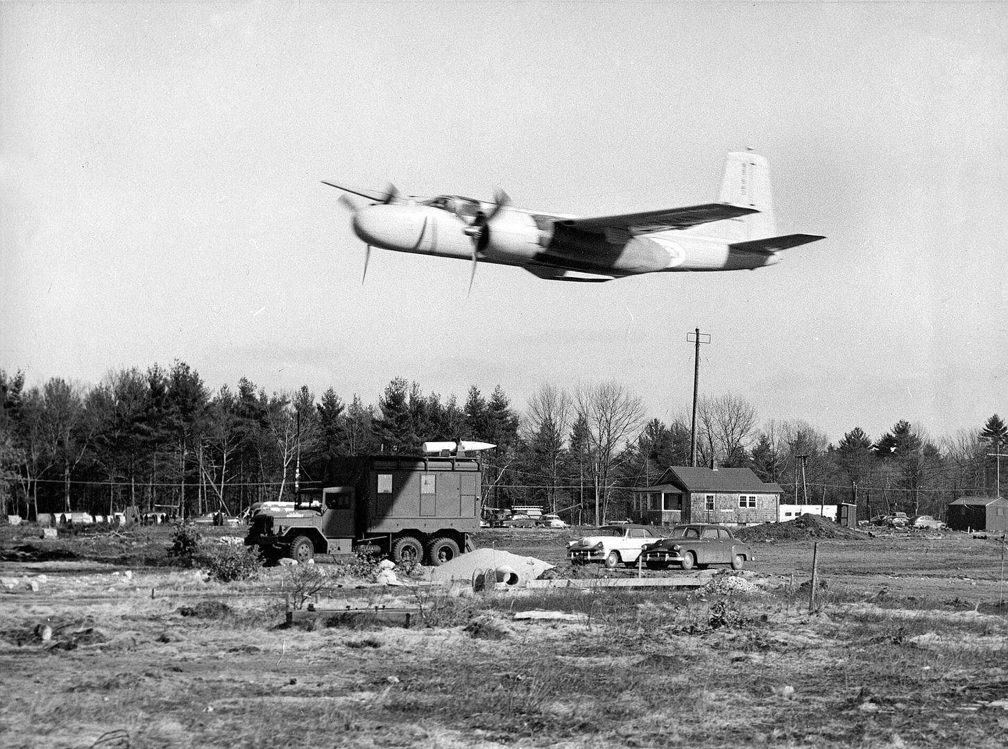 Douglas A-26 Invader attack bomber flying low over an airfield