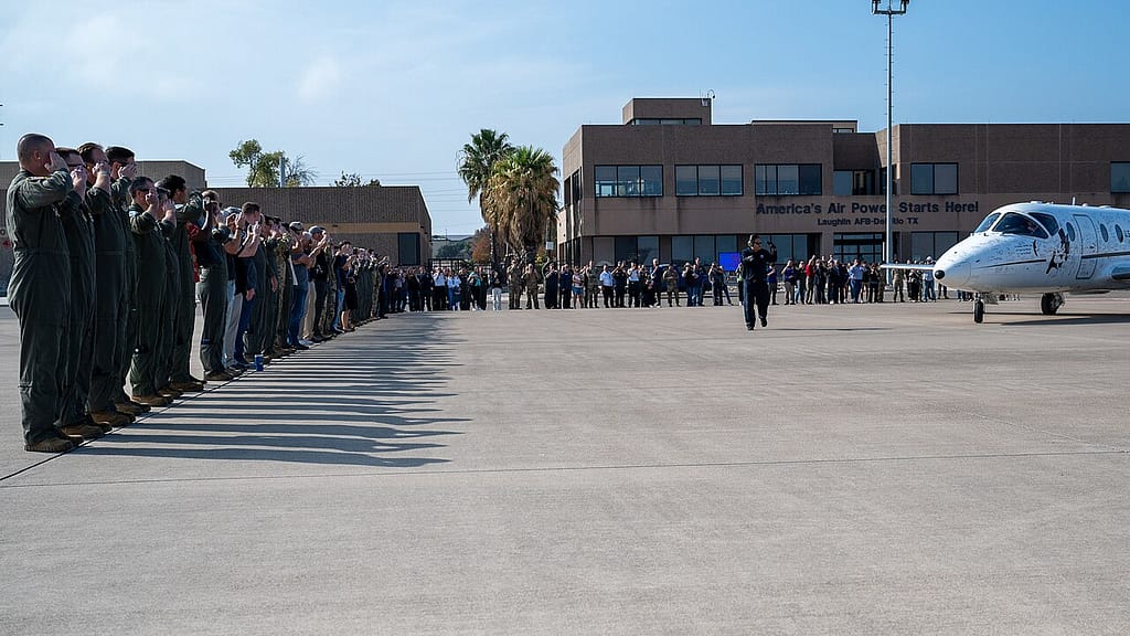 Airmen salute the T-1A Jayhawk