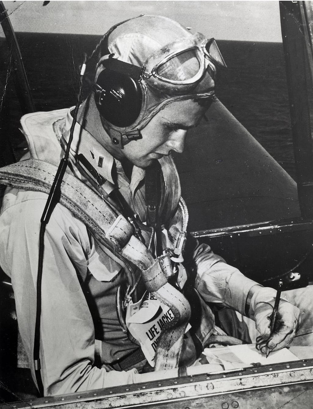 George H. W. Bush seated in the cockpit of a Grumman TBM Avenger, circa 1944