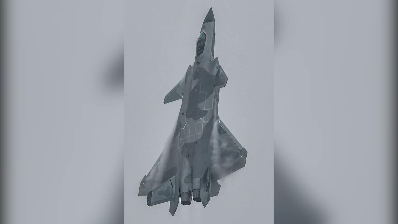 A Chengdu J-20 stealth fighter of the Chinese air force climbing vertically