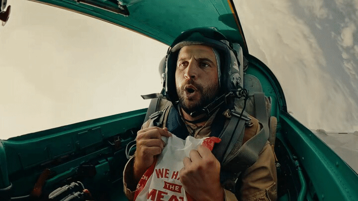 Animated sequence of Bob Menery reacting while eating an Arby’s cheesesteak in a MiG-21