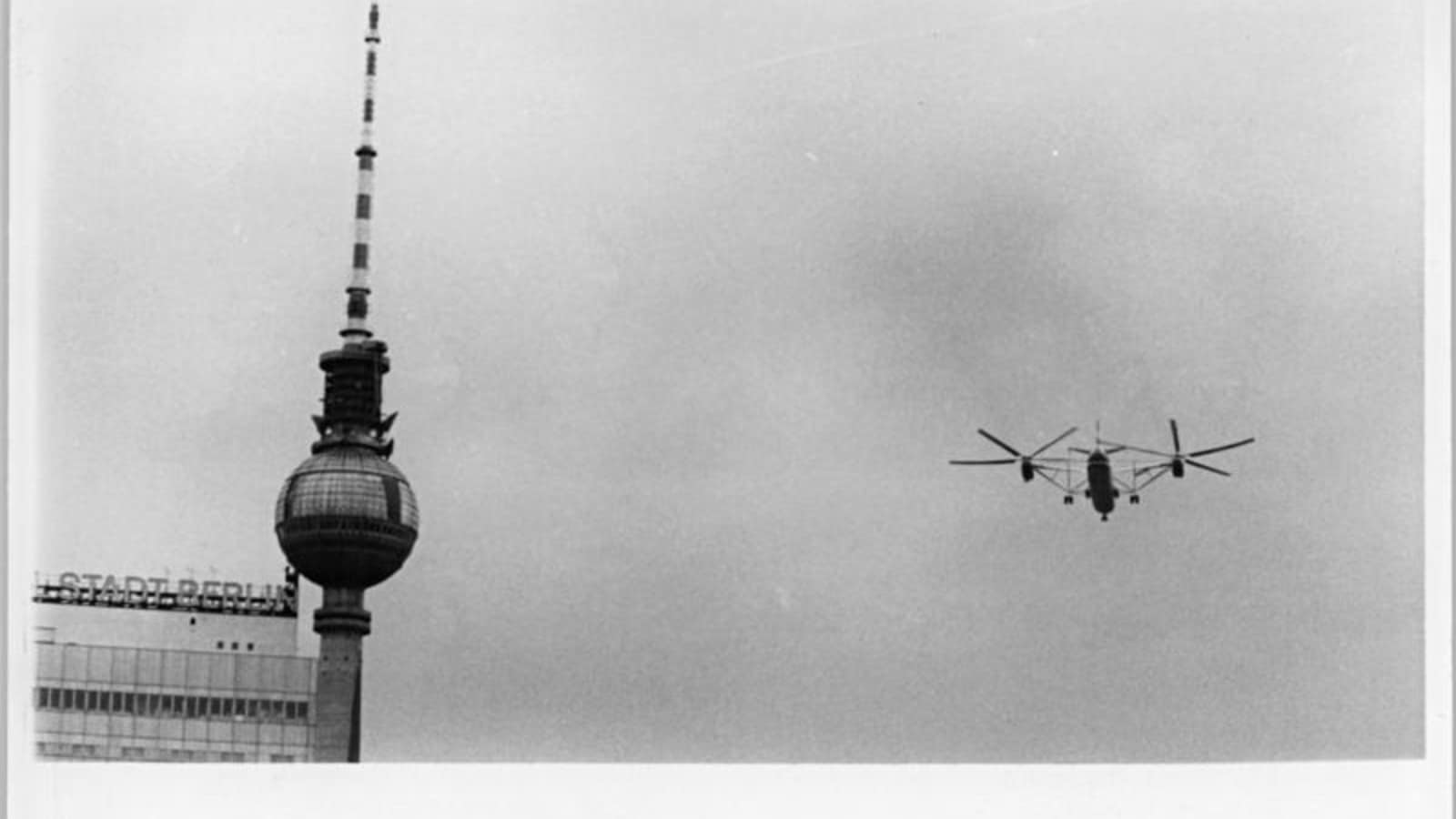 The Mil V-12, the largest helicopter ever built, in flight past the Berlin Fernsehturm on 17 June 1971