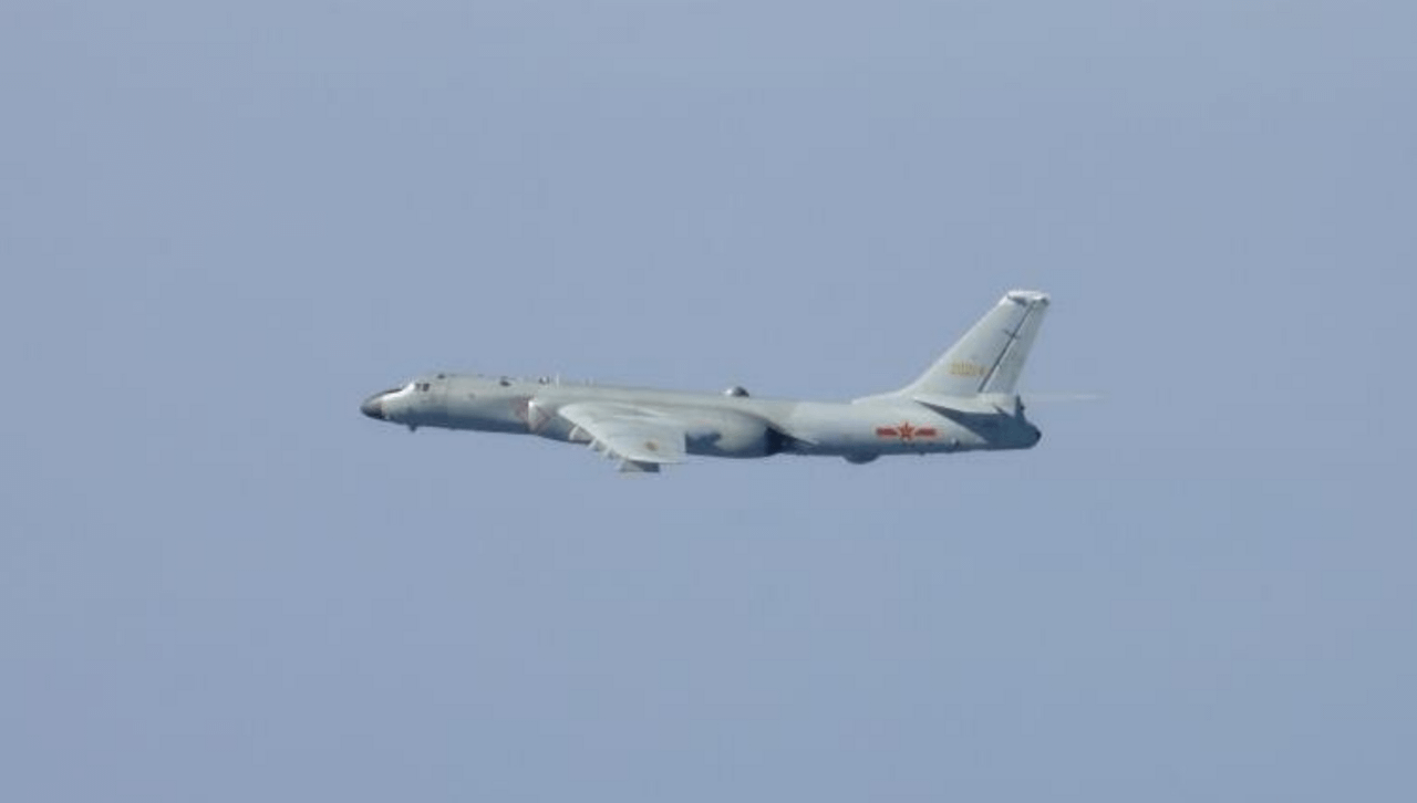 A PLAAF H-6 bomber photographed by scrambled fighters