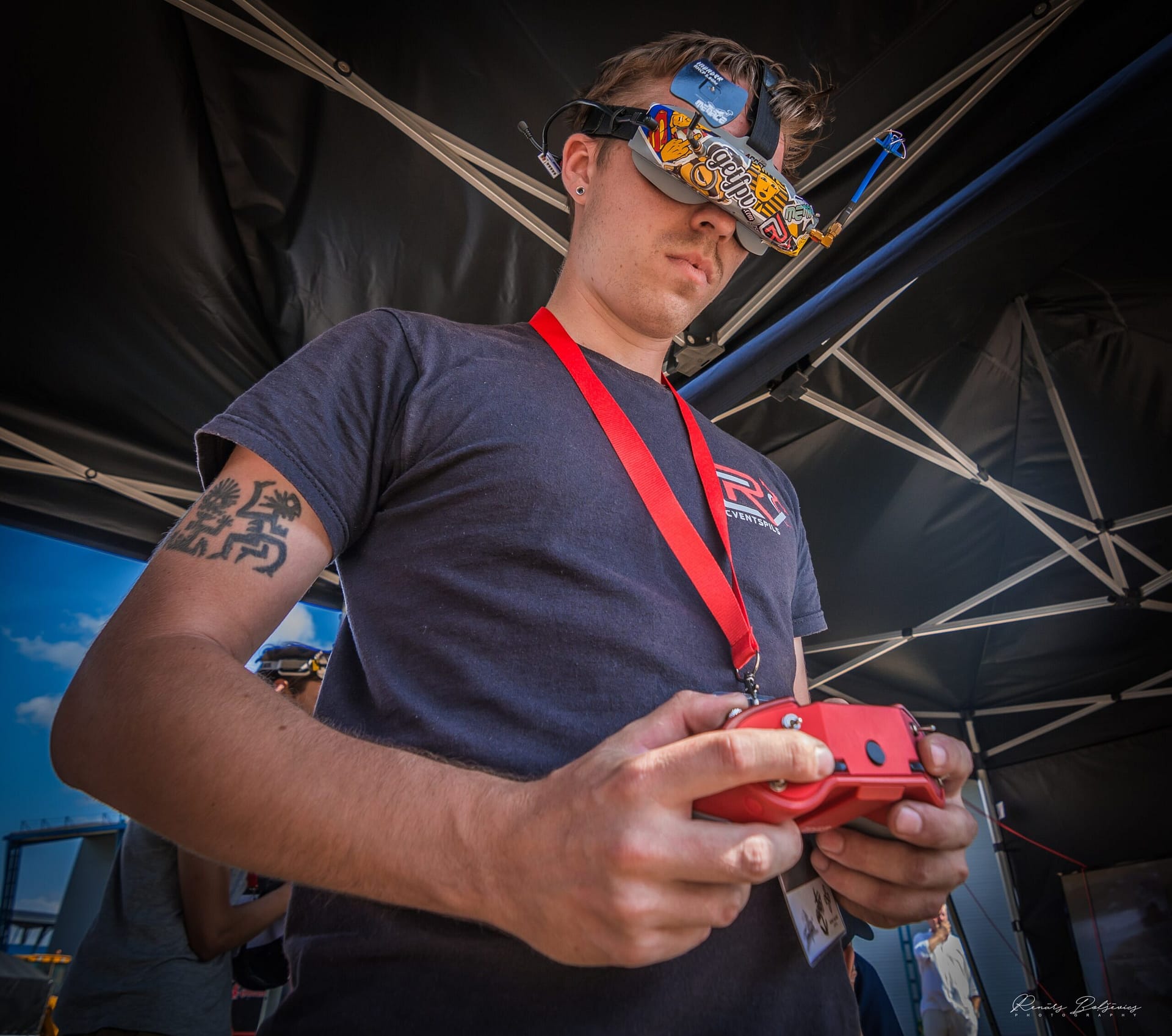 FPV quadcopter drone being prepared for combat use