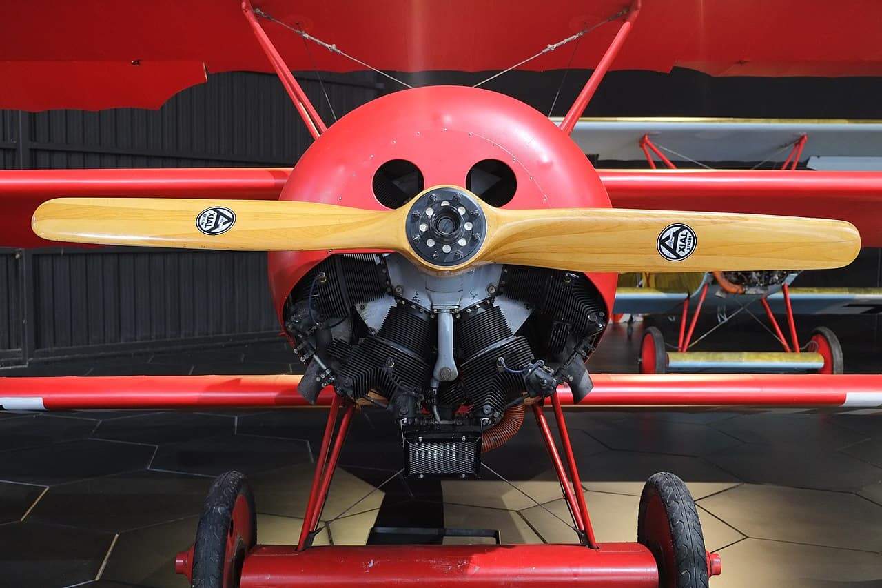 A Fokker Dr.I Dreidecker triplane replica — the iconic aircraft of Manfred von Richthofen, the Red Baron