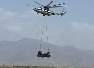 The Russian Mi Mil 26 lifting a Boeing CH-47 Chinook.